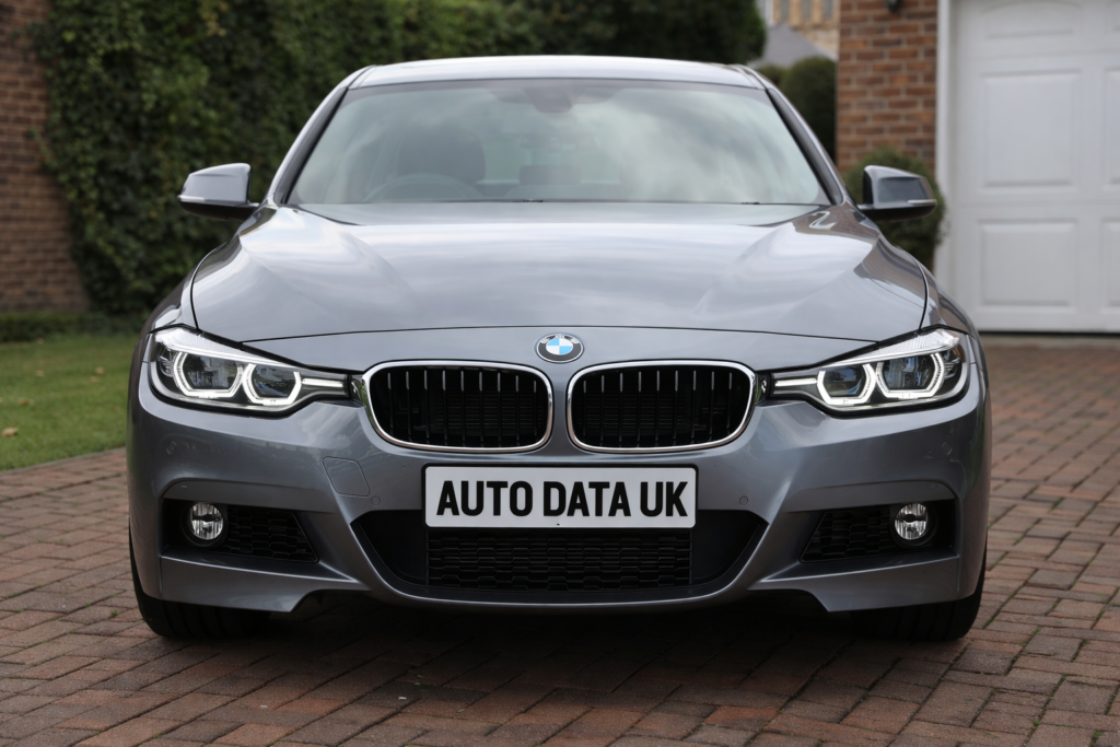 Used car parked on a driveway before purchase